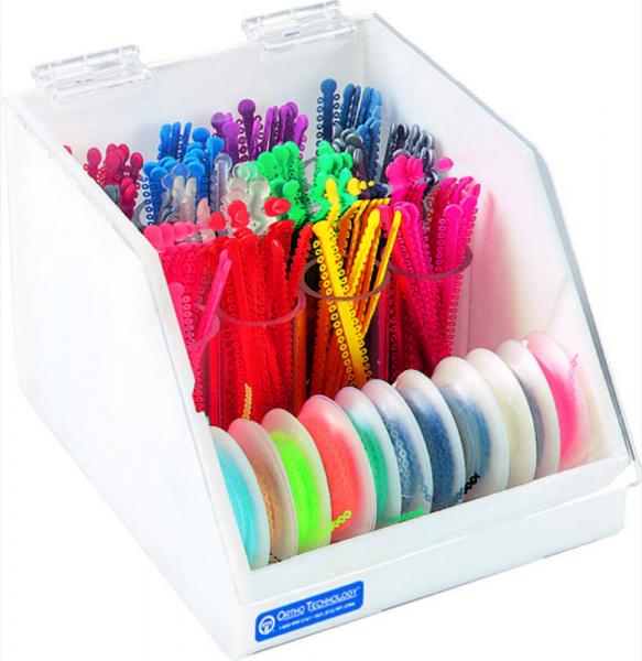 Organizzatore con la copertura per legature elastiche e piccole catene. Img: 201807031